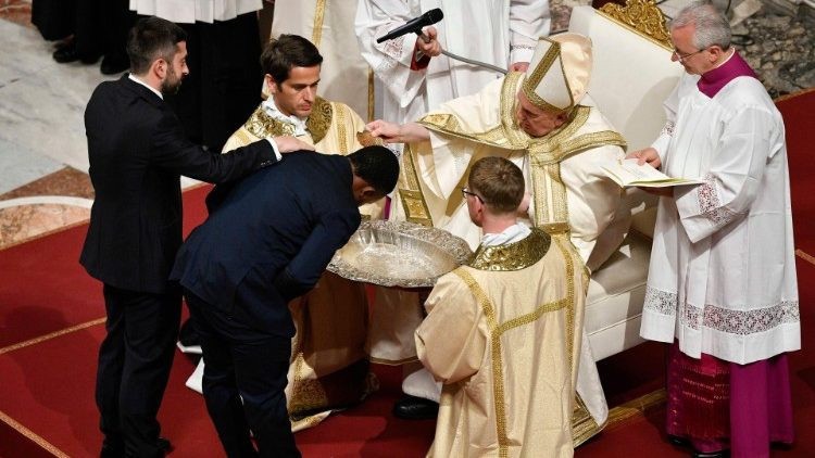 Pope Francis baptizes