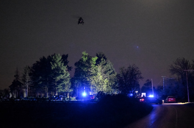 Source: Helicopters and thermal cameras are also used to search for the gunman SOURCE: AFP/ANDREJ ISAKOVIC