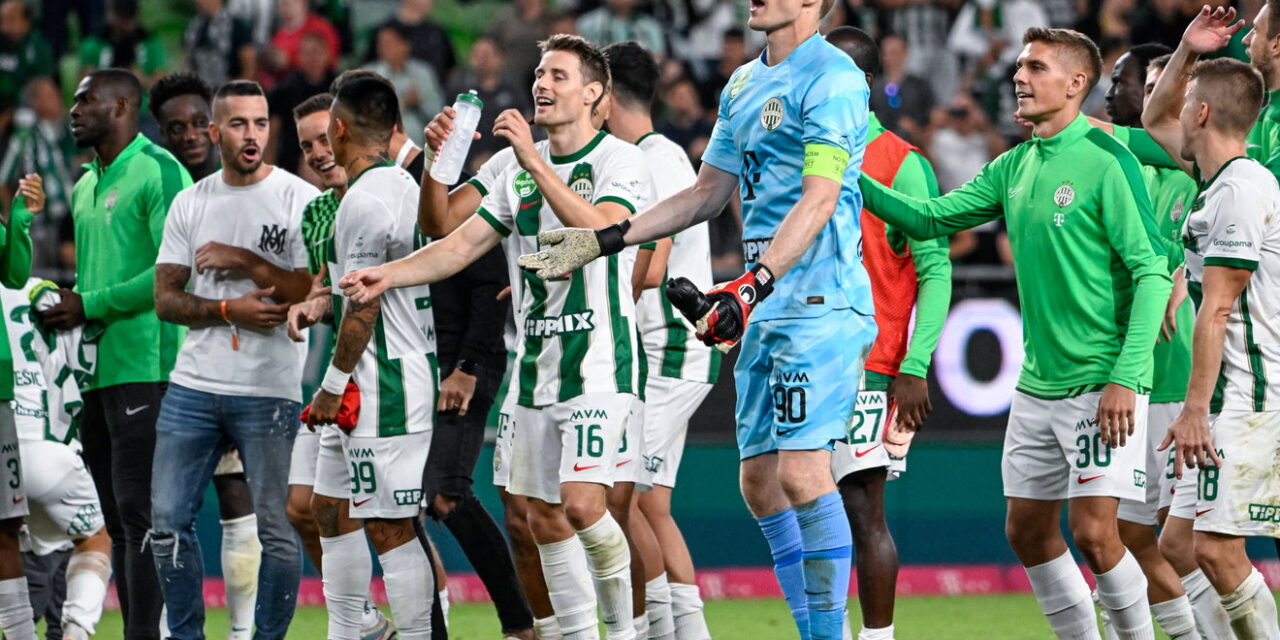 Teammates of Ferencvarosi TC celebrate after the UEFA Europa